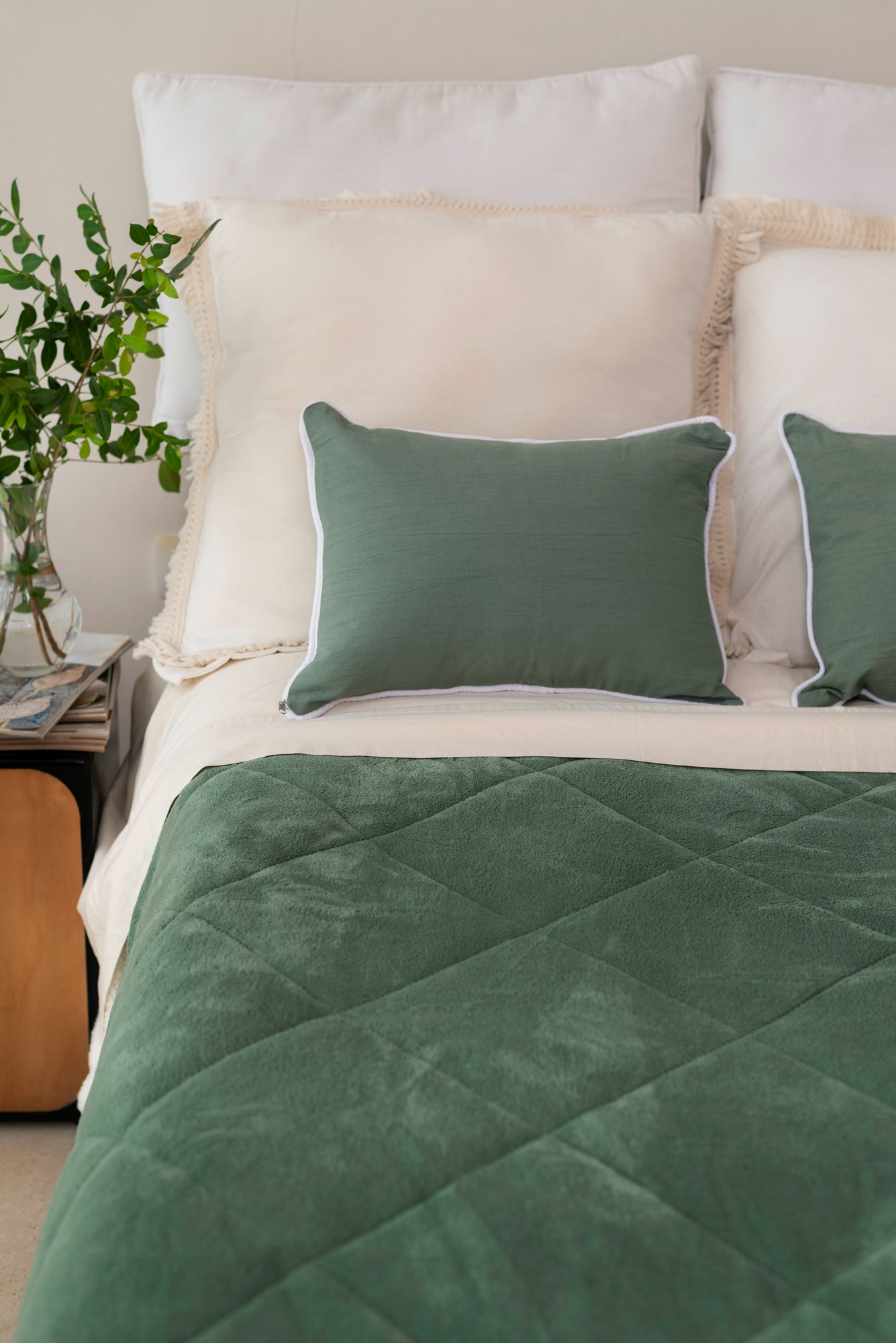 Comforters and linens being cleaned by Omni Cleaners in Houston, showcasing premium household cleaning services.